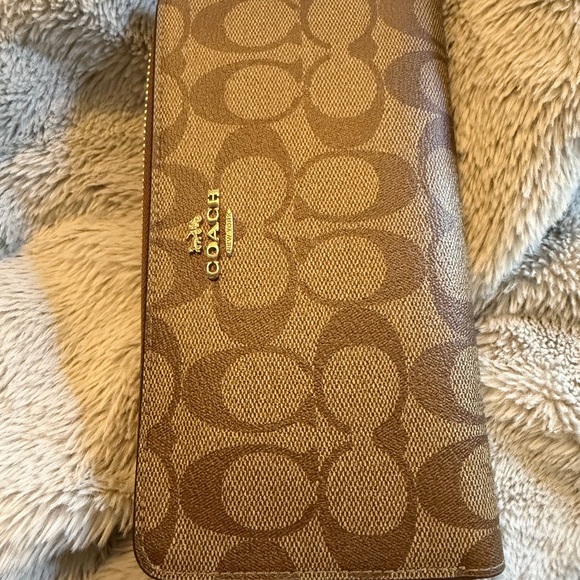 Coach Long Zip Around Wallet
In Signature Canvas - Picture 11 of 15